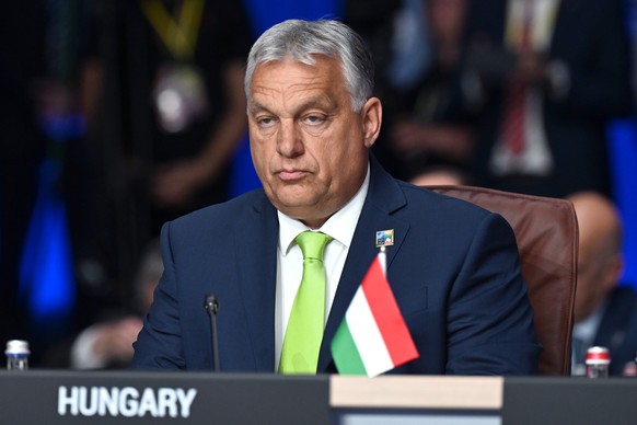 epa10739235 Hungarian Prime Minister Viktor Orban attends the meeting of the North Atlantic Council with Sweden at the NATO Summit in Vilnius, Lithuania, July 11, 2023. The North Atlantic Treaty Organization ...