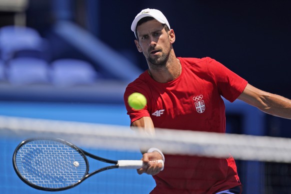 Novak Djokovic, of Serbia, practices at the Ariake Tennis Center ahead of the 2020 Summer Olympics, Friday, July 23, 2021, in Tokyo, Japan. (AP Photo/Seth Wenig)
Novak Djokovic