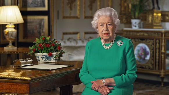 epa08344672 A handout photo made available on 05 April 2020 by the Buckingham Palace of Queen Elizabeth II during her address to the nation and the Commonwealth in relation to the coronavirus epidemic ...