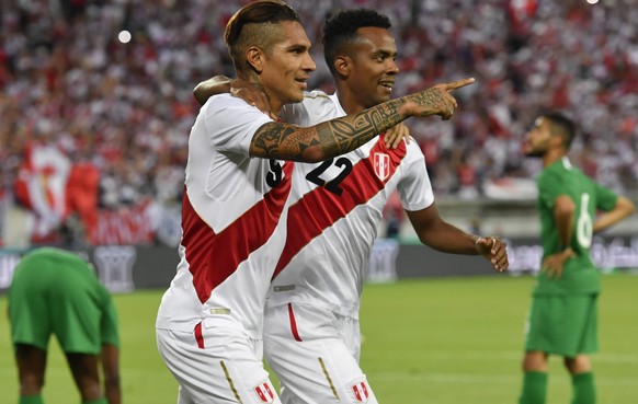 epa06783478 Peru&#039;s Paolo Guerrero (L) and Pedro Aquino celebrate during the friendly soccer match between Saudi Arabia and Peru at Kybunpark Stadium in St. Gallen, Switzerland, 03 June 2018. EPA/ ...