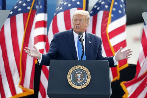 President Donald Trump speaks during a campaign rally in Greenville, N.C., Thursday, Oct. 15, 2020. (AP Photo/Karl DeBlaker)