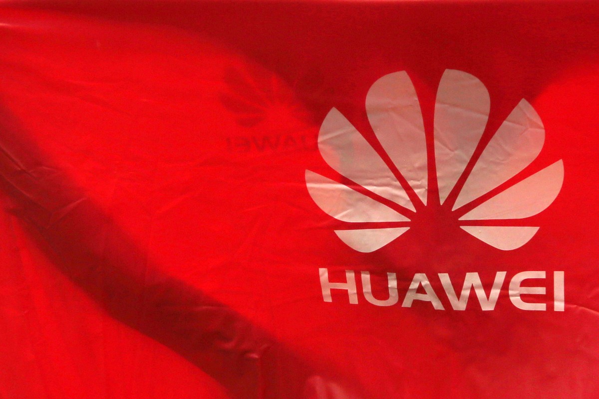epa07630610 Huawei logos are displayed in a raincoat in Phnom Penh, Cambodia, 06 June 2019. According to local media, Huawei smartphone sales have dropped in the capital's retail shop for more th ...