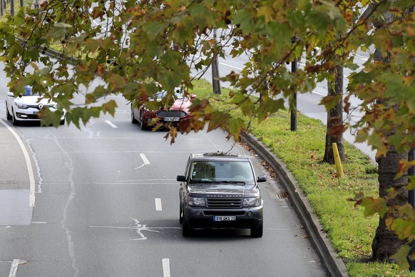 A SUV drives Wednesday, Nov. 13, 2019 in Paris. The world&#039;s thirst for oil will continue to grow until the 2030s, with climate-damaging emissions climbing until at least 2040 â?? and consumers&#0 ...