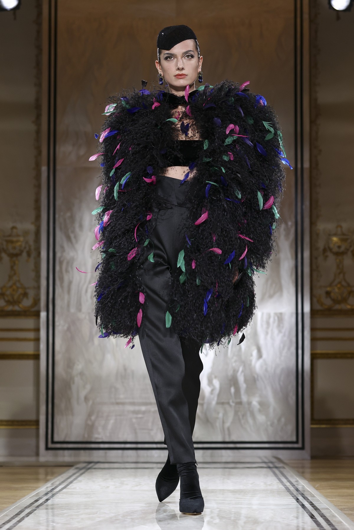 A model wears a creation as part of the Giorgio Armani Prive Fall-Winter 2025/26 Haute Couture collection presented Tuesday, July 8, 2025, in Paris. (AP Photo/Tom Nicholson)
France Fashion Giorgio Arm ...
