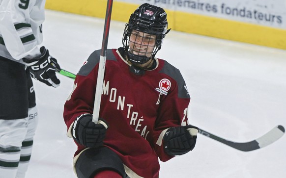 Montreal&#039;s Marie-Philip Poulin (29) reacts after scoring against Boston during first-period PWHL hockey game action in Montreal, Saturday, March 2, 2024. (Graham Hughes/The Canadian Press via AP)