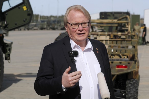 epa09887513 Swedish Minister of Defense Peter Hultqvist reacts during his visit to Adazi military base, Latvia, 13 April 2022. Peter Hultqvist pays a visit to Latvia to discuss regional security issue ...