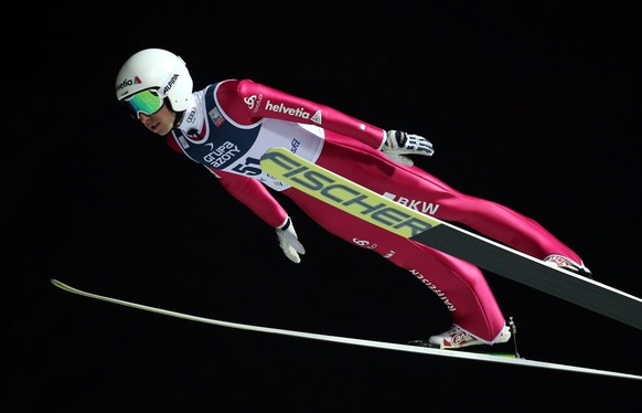 epa05192968 Simon Ammann of Switzerland in action during the qualification round for the FIS Ski Jumping World Cup in Wisla, Poland, 03 March 2016. EPA/Grzegorz Momot POLAND OUT
