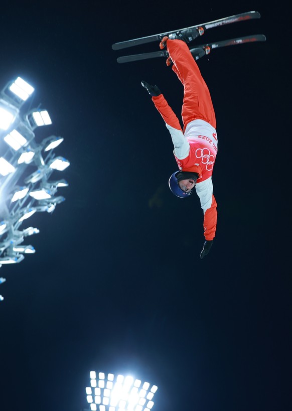 epa09758400 Noe Roth of Switzerland in action during the Men&#039;s Freestyle Skiing Aerials qualification at the Zhangjiakou Genting Snow Park at the Beijing 2022 Olympic Games, Beijing municipality, ...