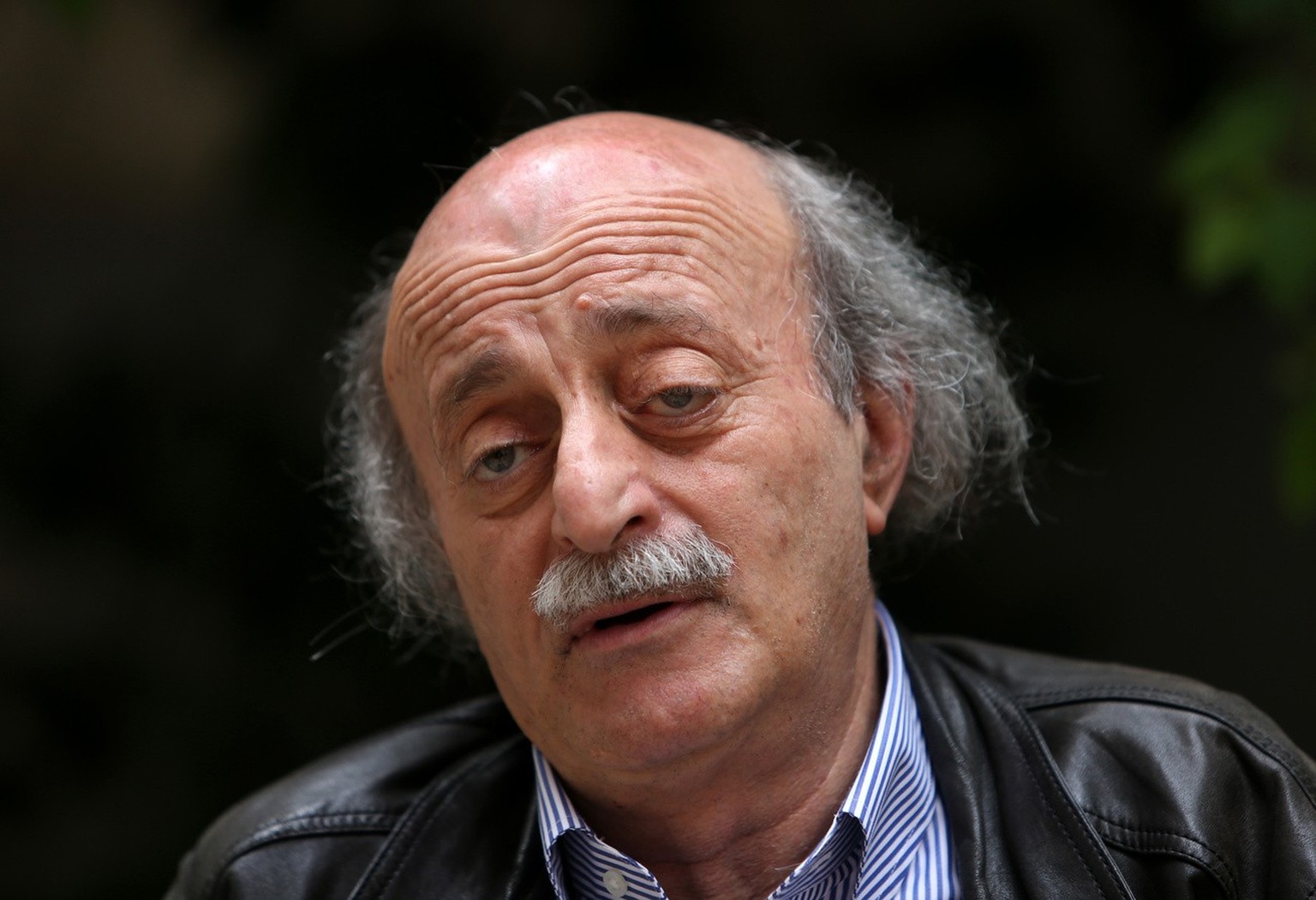 In this picture taken on May 28, 2014, Walid Jumblatt, the political leader of Lebanon&#039;s minority Druse sect, speaks during an interview with The Associated Press, as he sits in his garden house, ...