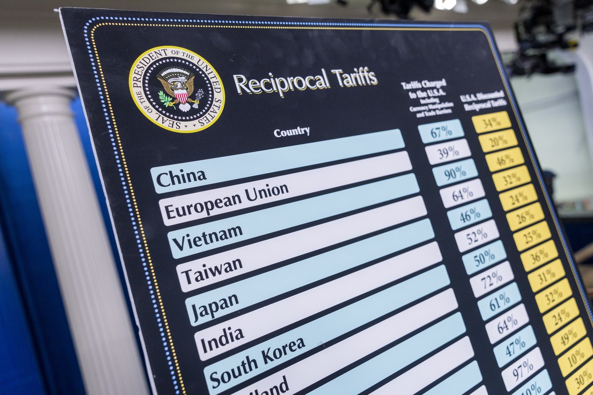 epaselect epa12007577 Charts listing the country by country tariffs President Trump levied on 'Liberation Day' are displayed in the press briefing room at the White House in Washington, DC,  ...