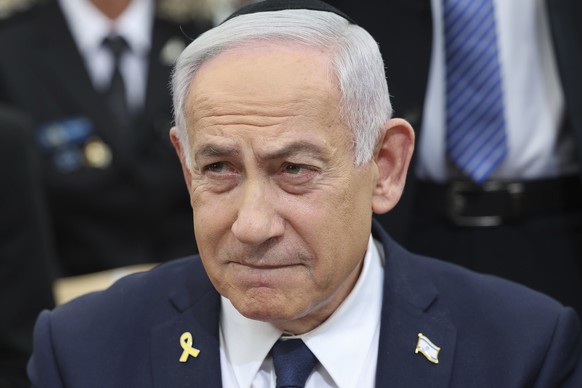 FILE - Israeli Prime Minister Benjamin Netanyahu attends a ceremony on the eve of Israel&#039;s Remembrance Day for fallen soldiers at the Yad LaBanim Memorial in Jerusalem, on April 29, 2025. (Abir S ...