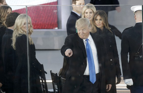 U.S. President-elect Donald Trump arrive with family members at the &quot;Make America Great Again! Welcome Celebration&quot; at the Lincoln Memorial in Washington, U.S., January 19, 2017. REUTERS/Mik ...