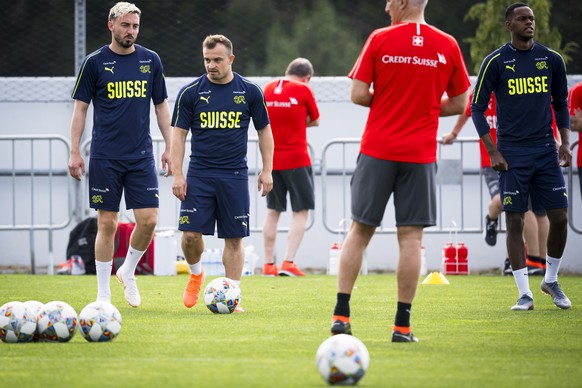 Switzerland&#039;s players Josip Drmic, Xherdan Shaqiri, Edimilson Fernandes from left to right, in action during a training session at the PortoGaia training center, in Crestuma near Porto, Portugal, ...