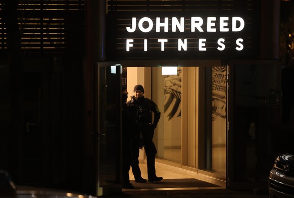 epa10579134 Police are investigating a knife attack site at a John Reed fitness studio in Duisburg, Germany, April 18, 2023. Police say at least four people were seriously injured in a knife attack...