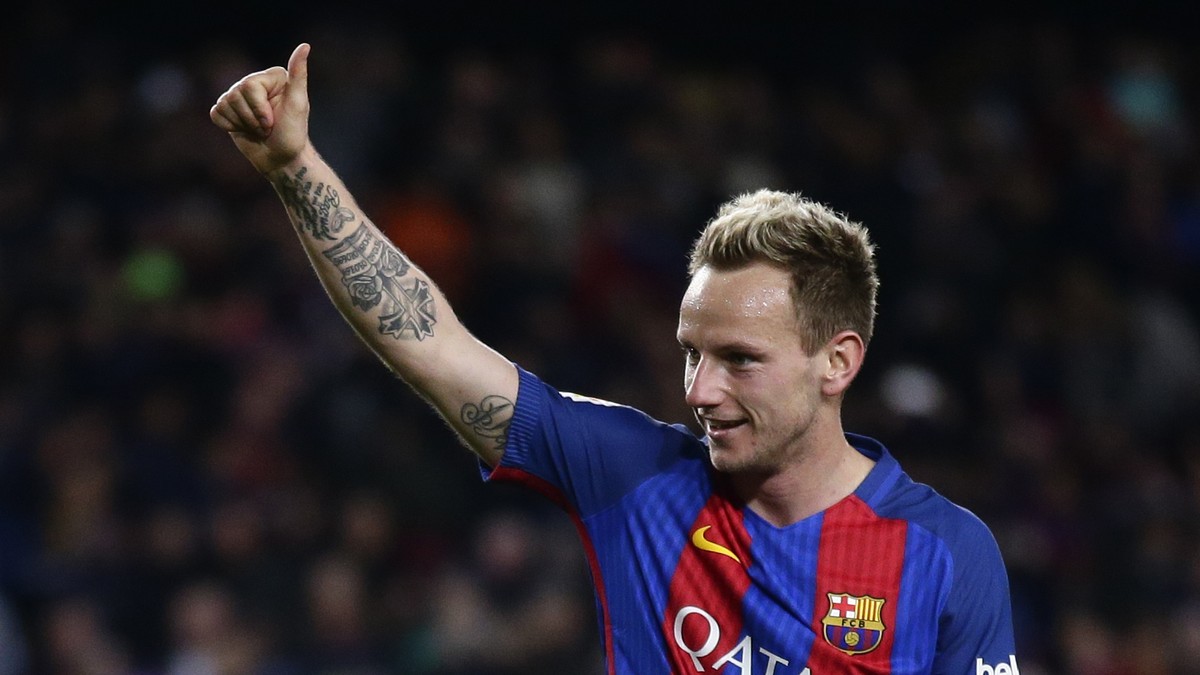 FC Barcelona's Ivan Rakitic celebrates after scoring during the Spanish La Liga soccer match between FC Barcelona and Celta Vigo at the Camp Nou in Barcelona, Spain, Saturday, March 4, 2017. (AP  ...