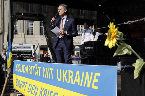 epa09836064 Swiss Federal President Ignazio Cassis speaks during a demonstration against the Russian invasion of Ukraine in front of the Swiss parliament building in Bern, Switzerland, 19 March 2022. ...