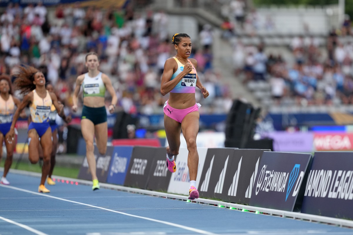 Audrey Werro, of Switzerland, right, leads Femke Broeders-Bol, of the Netherlands, and Anais Bourgoin, of France, across the finish line in the women's 800 meters at the Meeting de Paris Diamond  ...