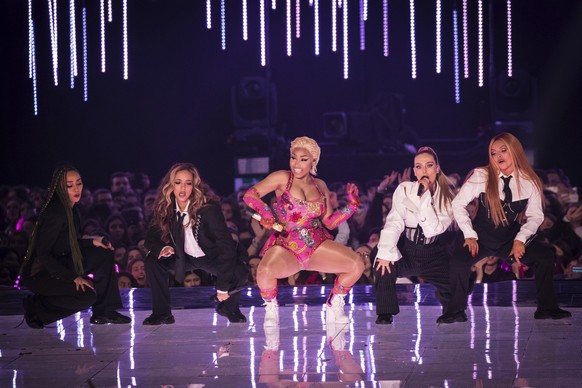 Singer Nicki Minaj, centre, performs with members of Little Mix, from left, Leigh-Anne Pinnock, Jade Thirlwall, Perrie Edwards and Jesy Nelson during the European MTV Awards in Bilbao, Spain, Sunday,  ...