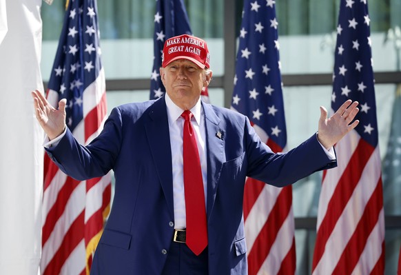 FILE - Republican presidential candidate former President Donald Trump enters at a campaign event, June 18, 2024, in Racine, Wis. Manhattan prosecutors are urging the judge overseeing Donald Trump?s c ...