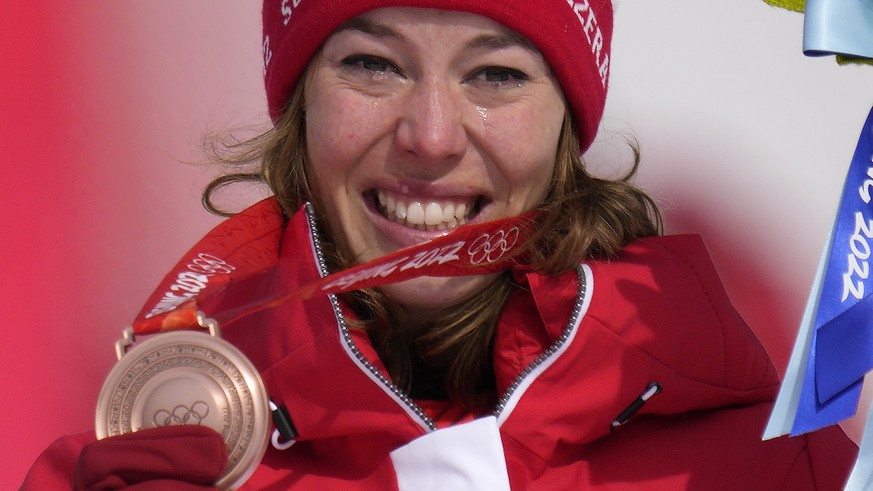 Michelle Gisin, of Switzerland, reacts during the medal ceremony after winning the bronze medal in the women&#039;s super-G at the 2022 Winter Olympics, Friday, Feb. 11, 2022, in the Yanqing district  ...