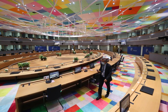 epa08549800 The meeting room where an EU leaders summit will take place is seen especially adapted to keep the social distancing amid the coronavirus disease (COVID19) outbreak, at the European Counci ...