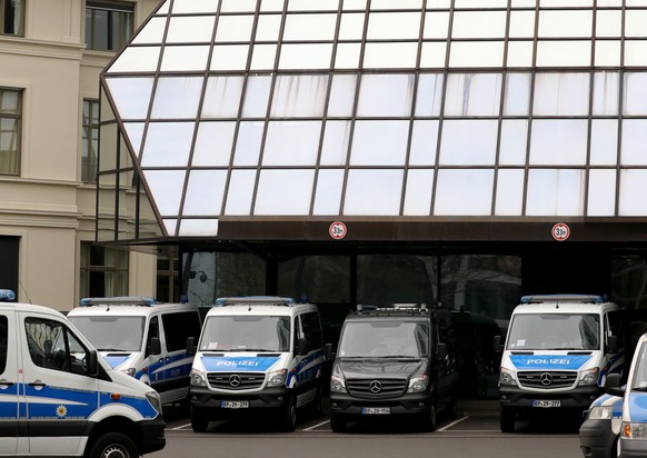 epa07196949 Police cars stand in front of Deutsche Bank headquarters in Frankfurt, Germany, 29 November 2018. Frankfurt prosecutors office confirmed to epa searches on suspicion of money laundering at ...