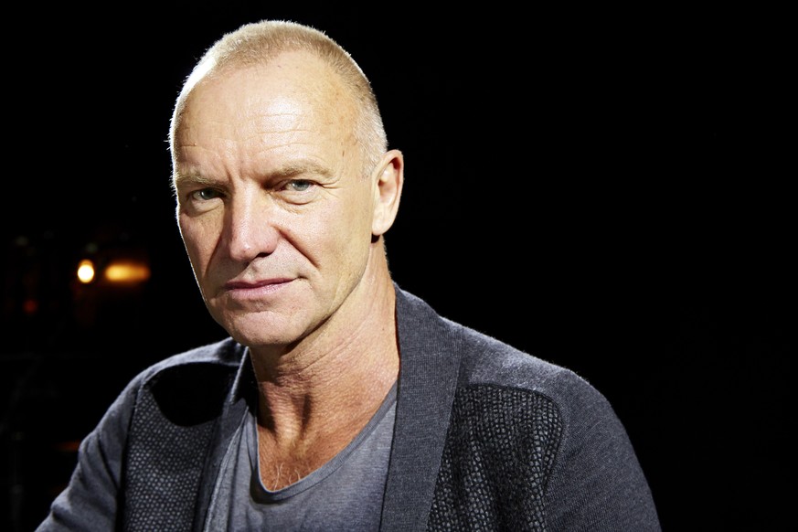 FILE - In this Sept. 26, 2013, file photo, Sting poses for a portrait at The Public Theater in New York. Sting will hit the stage at the American Music Awards next month, and the icon will also receiv ...