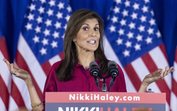 epa11081428 Former South Carolina Governor and Republican presidential candidate Nikki Haley addresses supporters gathered for a caucus night event at a hotel in West Des Moines, Iowa, USA, 15 January ...