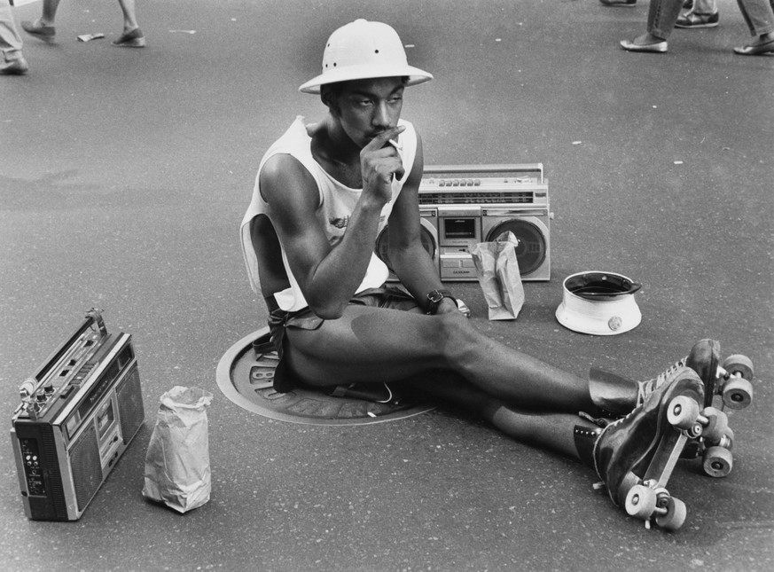A young man in roller skates and a pith helmet, New York City, circa 1970. (Photo by Erika Stone/Getty Images)