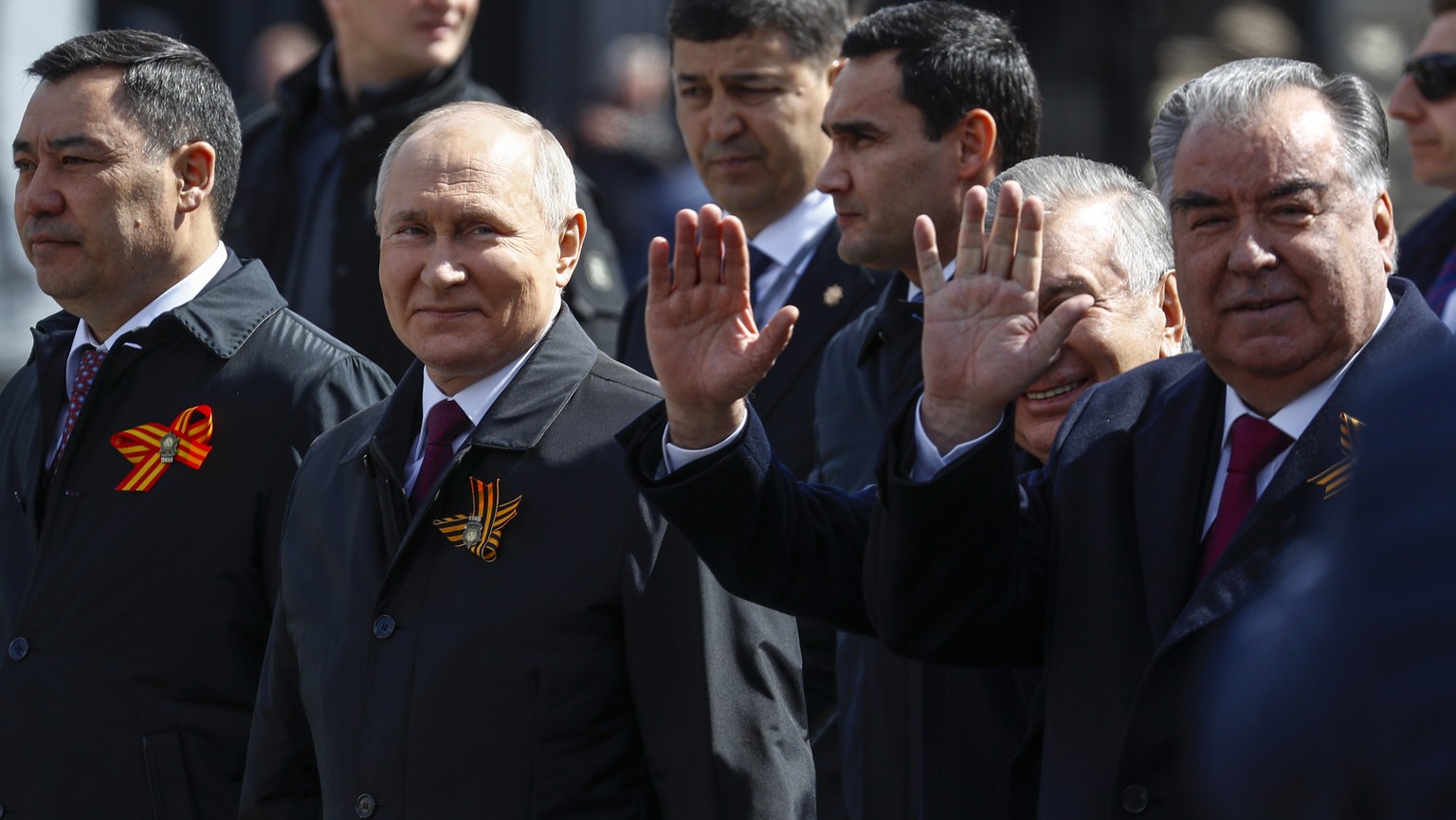 epa10616830 Kyrgyz President Sadyr Japarov (L), Russian President Vladimir Putin (2-L), Uzbek President Shavkat Mirziyoyev (2-R) and Tajik President Emomali Rahmon (R) walk after a military...