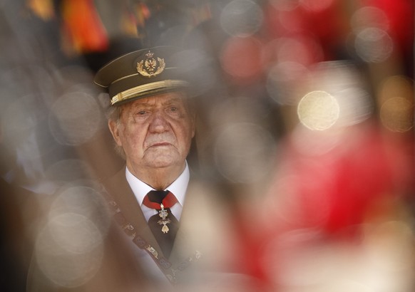 FILE - In this June 3, 2014 file photo then King Juan Carlos attends a military ceremony in San Lorenzo de El Escorial, outside Madrid, Spain. The royal family&#039;s website on Monday Aug. 3, 2020, p ...