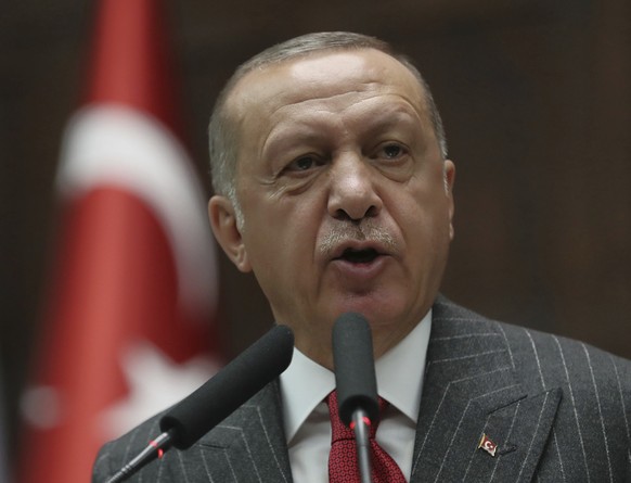 Turkey&#039;s President Recep Tayyip Erdogan addresses his MPs and supporters at parliament, in Ankara, Turkey, Tuesday, May 7, 2019. Ruling in favor of Erdogan&#039;s governing party, Turkey&#039;s t ...