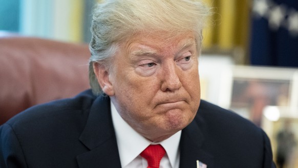 epa09179222 (FILE) - US President Donald J. Trump participates a briefing on Hurricane Dorian in the Oval Office of the White House in Washington, DC, USA, 04 September 2019 (reissued 05 May 2021). A  ...