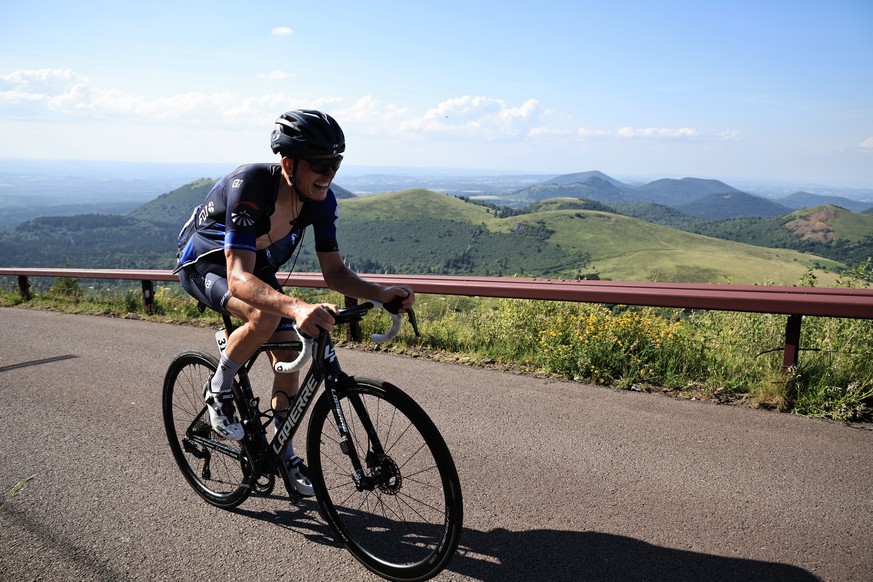 epa10736506 French rider David Gaudu of team Groupama-FDJ in action on the ascent of Puy de Dome during the 9th stage of the Tour de France 2023, a 184kms race from Saint-Leonard-de-Noblat to Puy de D ...
