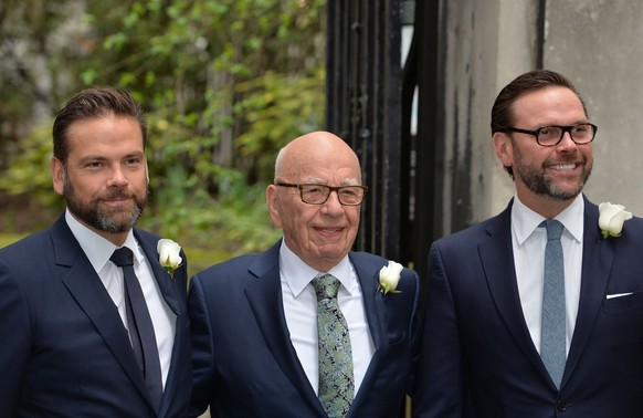 Media Proprietor Rupert Murdoch arrives at St Bride&#039;s Church in London accompanied by his sons James, right, and Lachlan, left, for a ceremony of celebration a day after the media mogul officiall ...