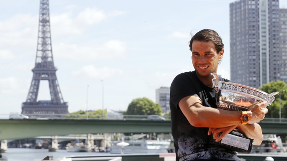 epa06024089 Rafael Nadal of Spain poses with his trophy the day after winning the Men’s singles final match against Stanislas Wawrinka of Switzerland during the French Open tennis tournament at Roland ...