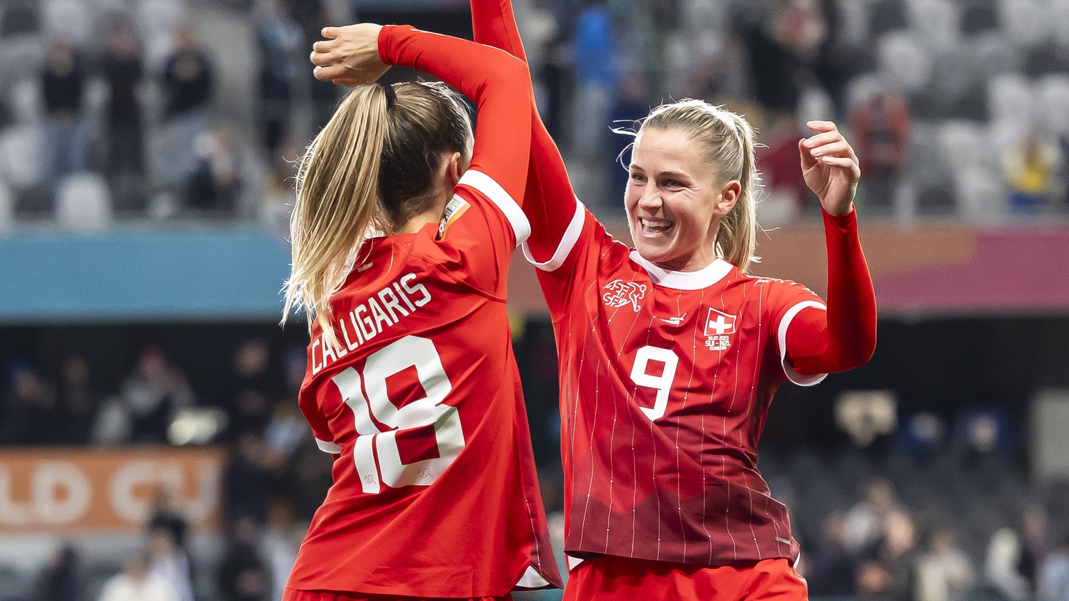 Switzerland&#039;s forward Ana Maria Crnogorcevic, right, and Switzerland&#039;s defender Viola Calligaris, left, celebrate after the FIFA Women&#039;s World Cup 2023 soccer match between Switzerland  ...