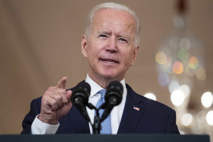 epa09439350 US President Joe Biden delivers remarks on the end of the war in Afghanistan, in the State Dining Room of the White House, in Washington, DC, USA, 31 August 2021. The last military flight  ...