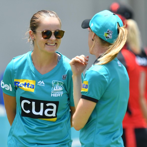 IMAGO / AAP
CRICKET WBBL HEAT RENEGADES, World number one tennis player Ashleigh Barty (left) is seen talking to Kirby Short (right) of the Heat before the Women s Big Bash League (WBBL) cricket matc ...
