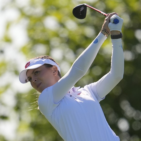 Morgane Metraux, of Switzerland, hits her shot from the 6th tee during the second round of the women&#039;s golf event at the 2024 Summer Olympics, Thursday, Aug. 8, 2024, at Le Golf National, in Sain ...