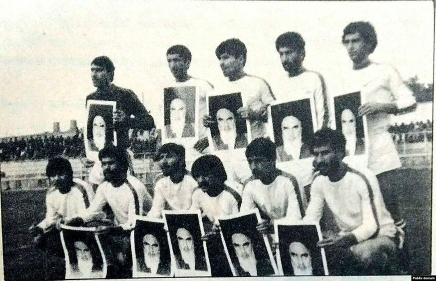 Habib Khabiri, an Iranian footballer and activist, refuses to hold a portrait of Khomeini in 1982.