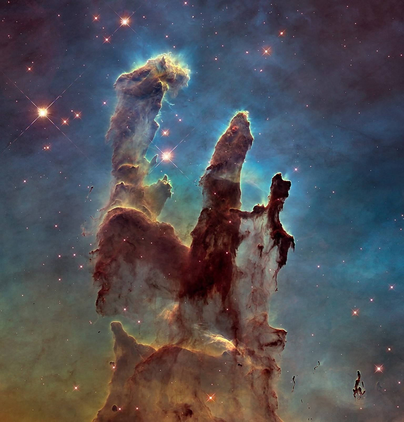 Hochaufgelöste Aufnahme der Säulen der Schöpfung, die 2014 als Würdigung für das Original von 1995 gemacht wurde.
Von NASA, ESA, and the Hubble Heritage Team (STScI/AURA) - http://hubblesite.org/image ...
