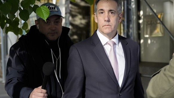 Michael Cohen leaves his apartment building on his way to Manhattan criminal court, Monday, May 13, 2024, in New York. (AP Photo/Julia Nikhinson)