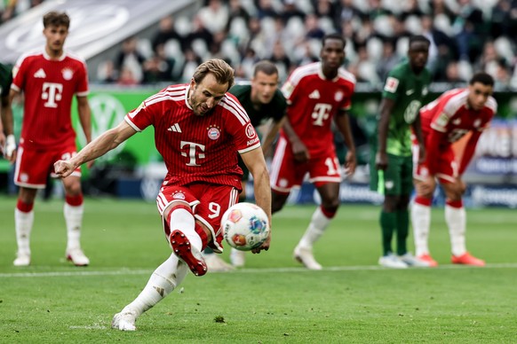 epa12944142 Harry Kane of Bayern Munich takes a penalty kick during the German Bundesliga soccer match between VfL Wolfsburg and Bayern Munich in Wolfsburg , Germany, 09 May 2026. EPA/FILIP SINGER The ...