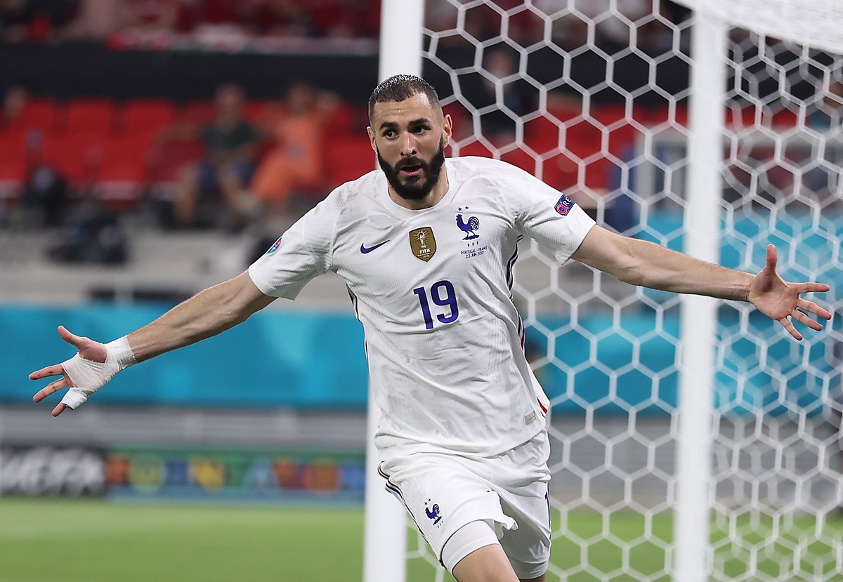 epa09297561 Karim Benzema of France celebrates after scoring his team's second goal during the UEFA EURO 2020 group F preliminary round soccer match between Portugal and France in Budapest, Hunga ...