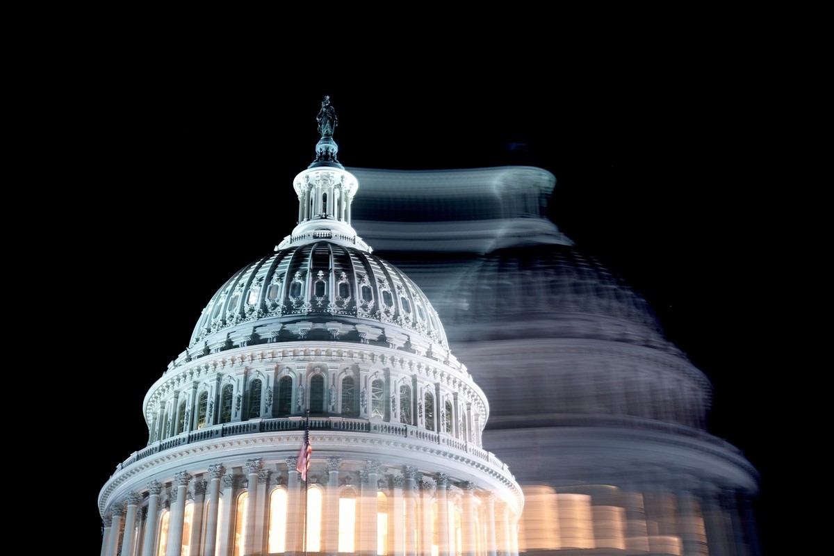 The U.S. Capitol building against a dark sky in Washington, D.C., U.S. Photographer: Stefani Reynolds/Bloomberg