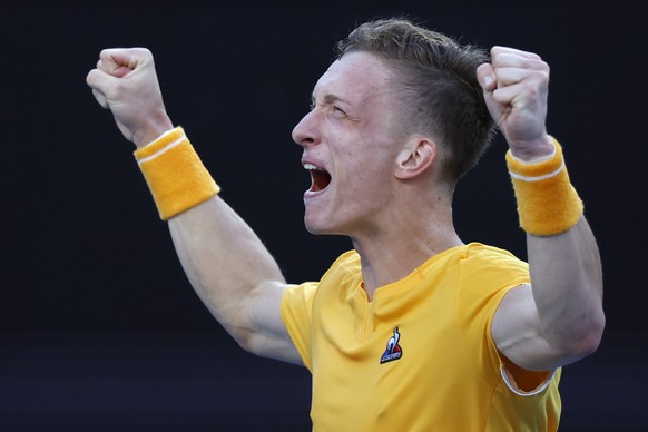 Jiri Lehecka of the Czech Republic celebrates after defeating Cameron Norrie of Britain in their third round match at the Australian Open tennis championship in Melbourne, Australia, Friday, Jan. 20,  ...