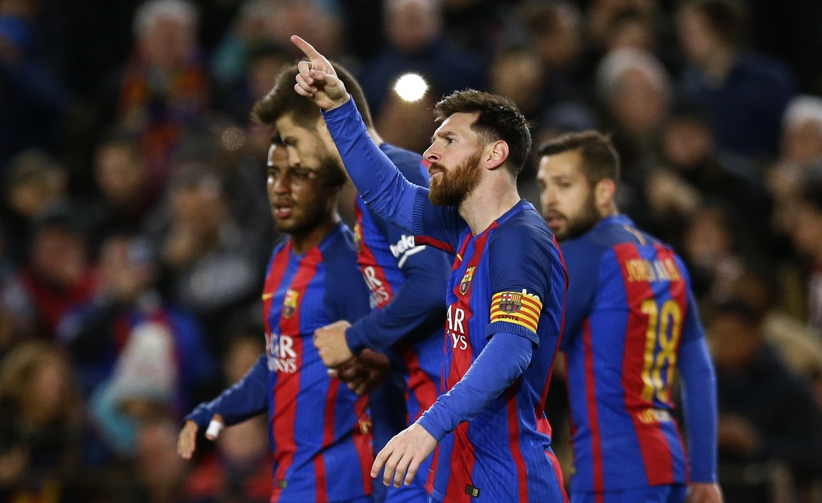 FC Barcelona's Lionel Messi gestures after scoring during the Spanish La Liga soccer match between FC Barcelona and Celta Vigo at the Camp Nou in Barcelona, Spain, Saturday, March 4, 2017. (AP Ph ...