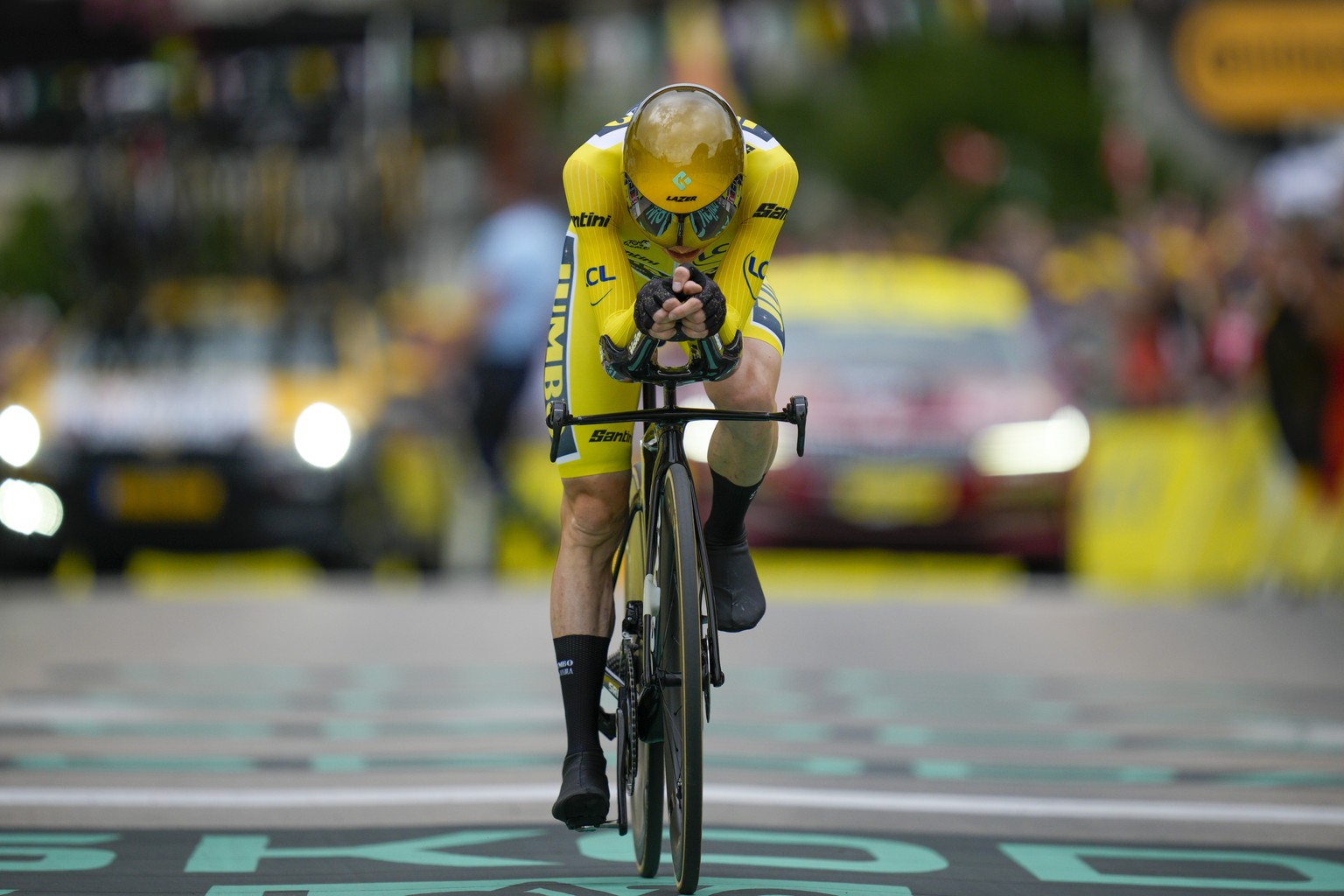 Stage winner and overall leader Denmark&#039;s Jonas Vingegaard climbs during the sixteenth stage of the Tour de France cycling race, an individual time trial over 22.5 kilometers (14 miles) with star ...