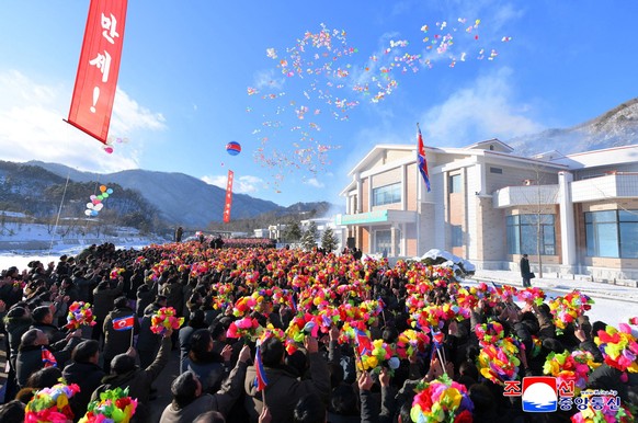 People attend the inauguration of the Onpho workers' recreation center, in Kyongsong, North Hamgyong province, North Korea, released January 21, 2026. KCNA via REUTERS ATTENTION EDITORS - THIS IM ...